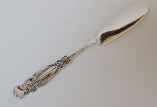 An Unusual Victorian Gothic Silver Butter Knife.