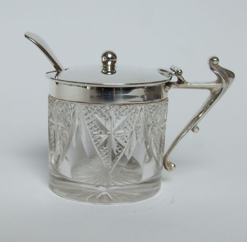 An Unusual Edwardian Silver Mounted Mustard Pot and Spoon.