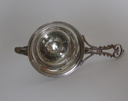 A Gorgeous Small Silver Tea Strainer.