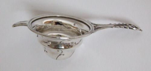 fig 1. A gorgeous small silver tea strainer.