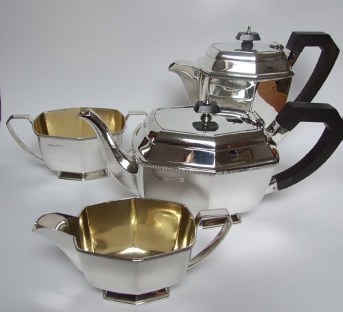 A Stylish Four Piece Hallmarked Silver Tea Set in the Art Deco Style.