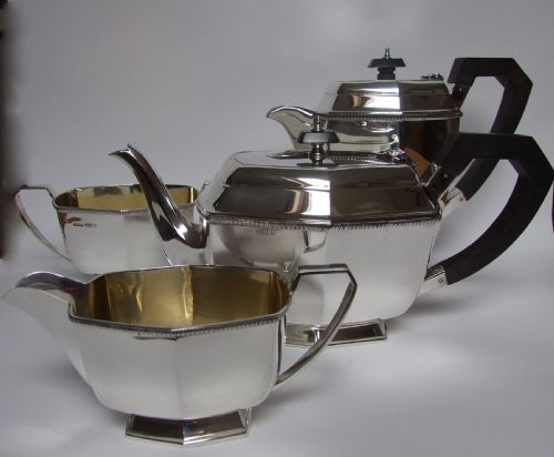 fig 1.  A stylish four piece hallmarked silver tea set in the Art Deco style.