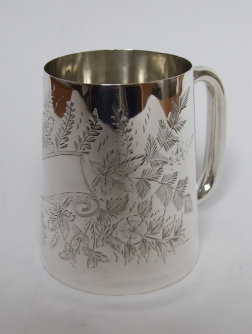 A Charming Victorian Engraved Silver Christening Mug.