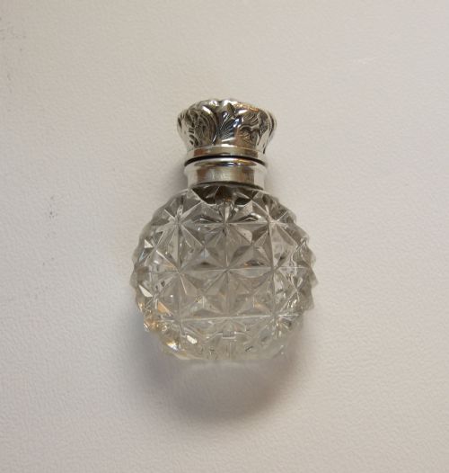 A Gorgeous Victorian Silver Mounted Perfume Bottle.