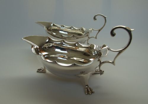 A Gorgeous Pair of Edwardian Silver Cream Boats.