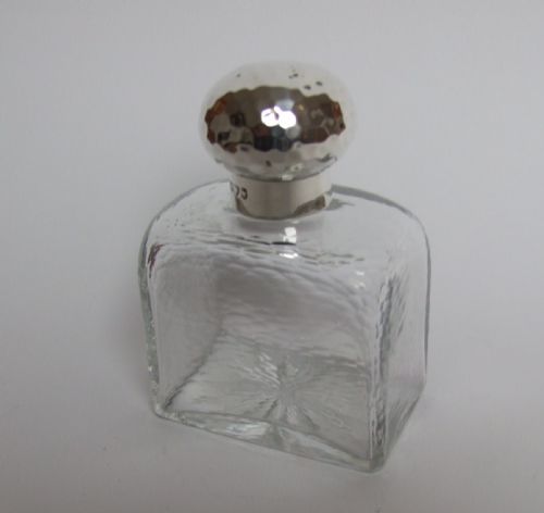 A Gorgeous Victorian Silver Mounted Cologne Bottle in Arts & Crafts Style.