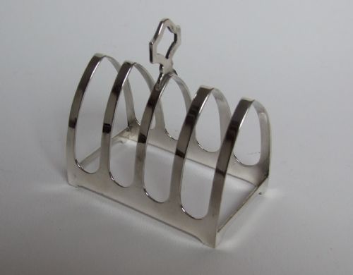 Charming Gothic Style Silver Toast Rack.