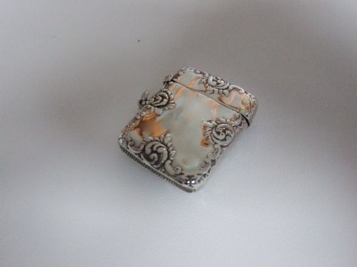fig 1. A good Victorian silver vesta with floral decoration.