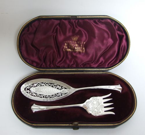 A Stunning Boxed Pair of Silver Onslow Pattern Sardine Servers.