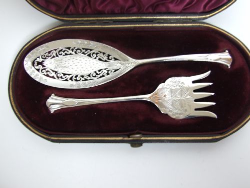fig 1. A stunning boxed pair of silver Onslow pattern sardine servers.