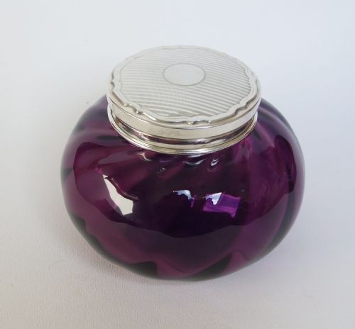 A Wonderful Silver Topped Powder Bowl in Amethyst Glass.