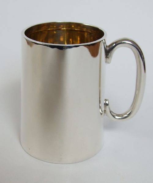 A Handsome Edwardian Silver Gilt Mug.