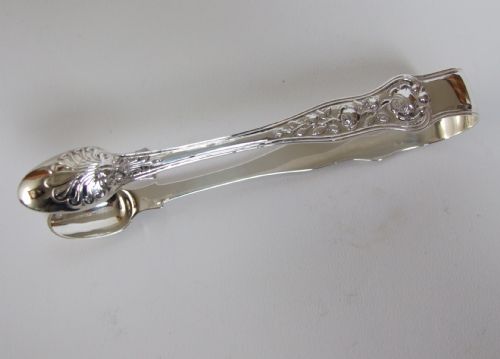 A Quality Pair of Victorian Silver Tongs in the Rare Rose Pattern.