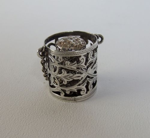 A Lovely Edwardian Pierced Silver Thimble Holder with Thimble.