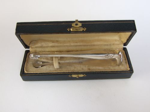 A Splendid Pair of French Silver Plated Art Deco Tongs.