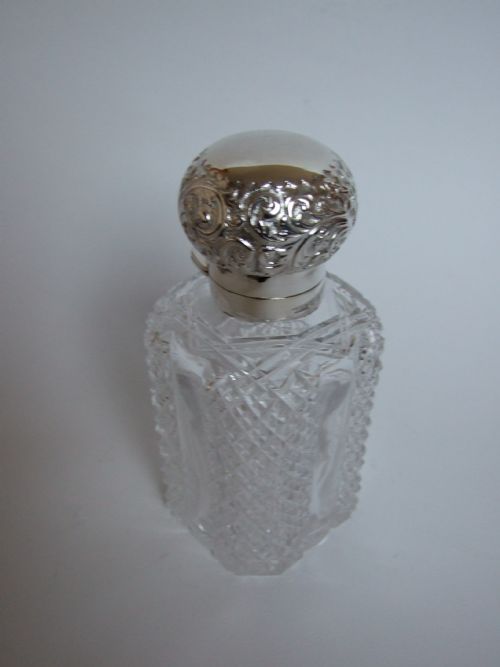 fig 1. A beautiful Victorian silver mounted cologne bottle.