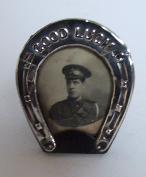 A Charming Miniature Silver 'Good Luck' Photo Frame.