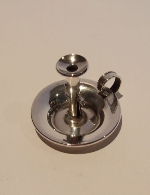 A Charming Miniature Victorian Silver Chamber Stick.