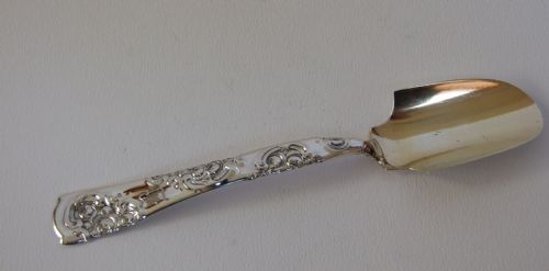 A Fine Sterling Silver Stilton Scoop.