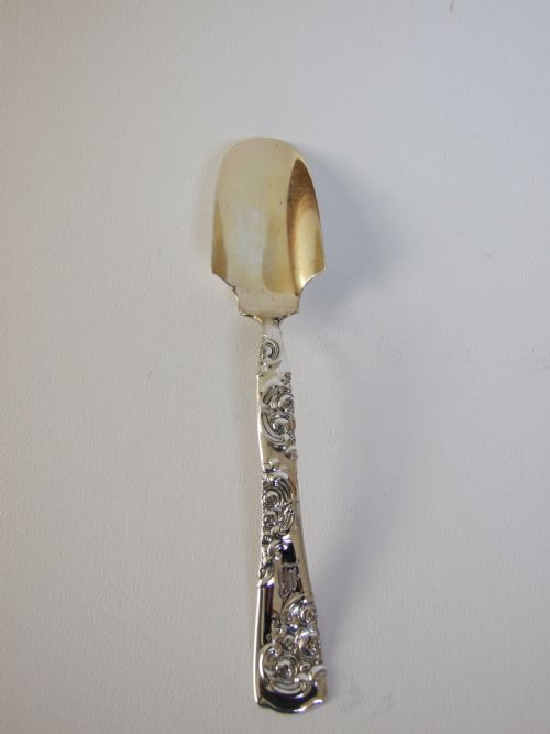 fig 1. A fine Sterling silver stilton scoop.