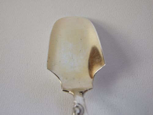 fig 2. A fine Sterling silver stilton scoop.