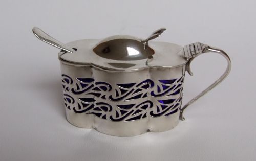 An Unusual Edwardian Silver Shaped Mustard Pot & Spoon.