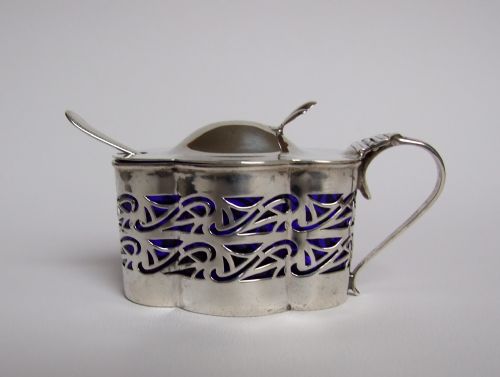 fig 1. An unusual Edwardian silver shaped mustard pot & spoon.