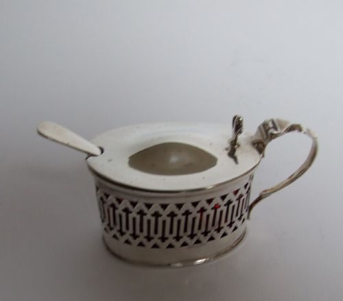 fig 1. An unusual silver & cranberry mustard pot & spoon.