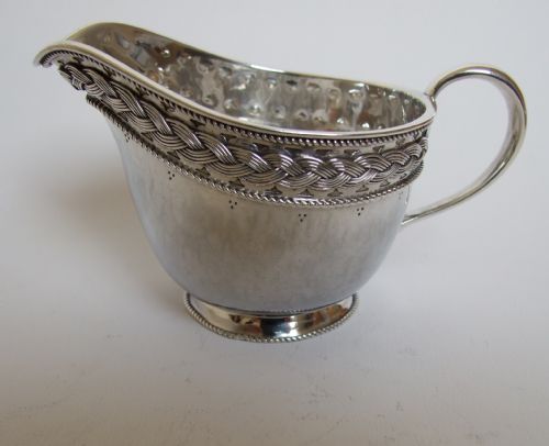 A Liberty Silver Arts & Crafts Cream Jug.