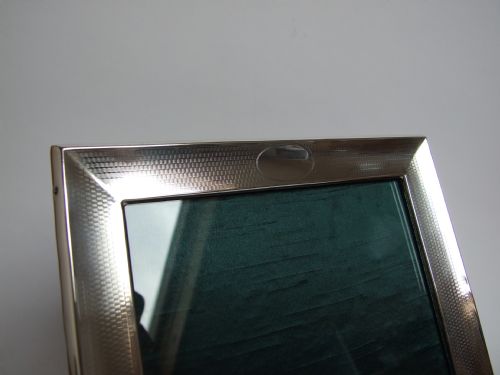 fig 1. A handsome engine turned silver photo frame.