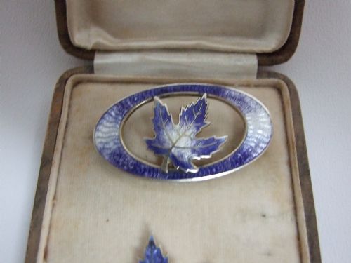 fig 1. A rare silver & guilloche enamel boxed brooch set.