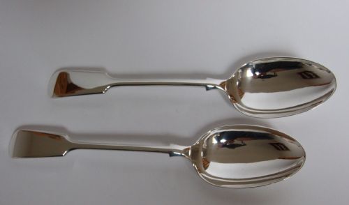 A Handsome Pair of Edwardian Silver Serving Spoons by Mappin & Webb.