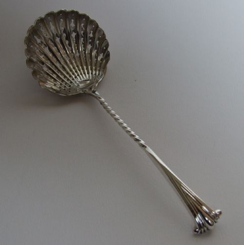 A Charming Victorian Silver Onslow Pattern Sifter Spoon.