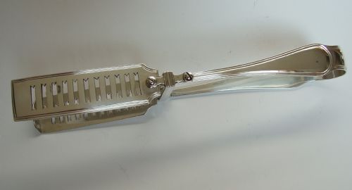 A Superb Pair of Victorian Silver Asparagus Tongs.