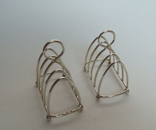 A Charming Pair of Small Breakfast Tray Silver Toast Racks.