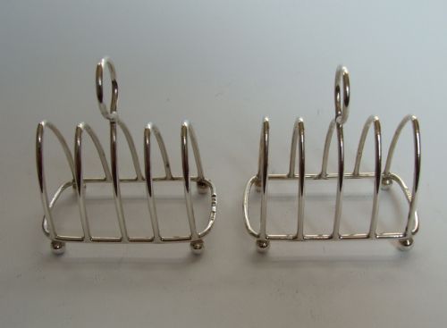 fig 1. A charming pair of small breakfast tray silver toast racks.