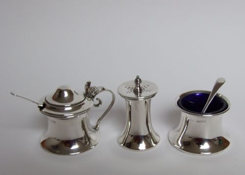 fig 1. A charming George V silver three piece cruet.
