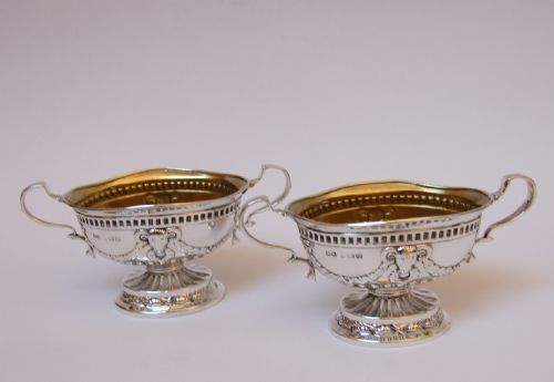 A Wonderful Pair of Silver Condiment Tubs, with Rams Head Decoration.