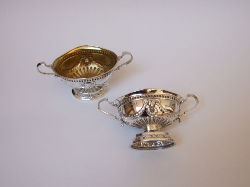 fig 1. A wonderful pair of silver condiment tubs, with Rams head decoration.