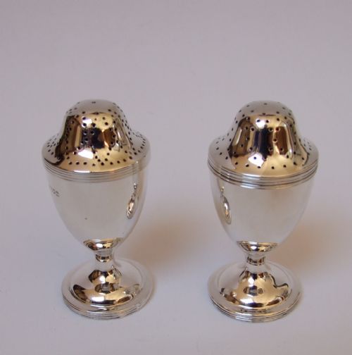 A Fine Pair of George V Silver Pepper Pots.