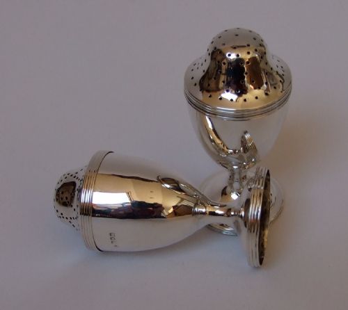 fig 1. A fine pair of George V silver pepper pots.