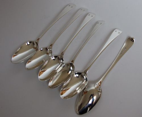 fig 1. A rare set of 18th Century silver dessert spoons.