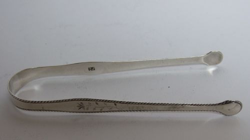 fig 1. A charming pair of Hester Bateman silver tongs.