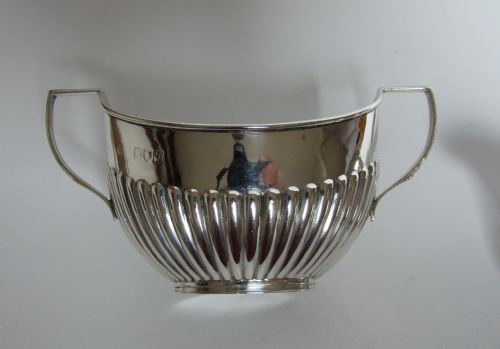 fig 2. A charming Victorian silver cream & sugar.