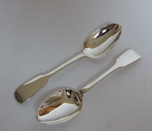 A Fine Pair of Silver Fiddle Pattern Dessert Spoons.