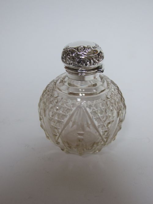 A Gorgeous Silver Mounted Victorian Perfume Bottle.