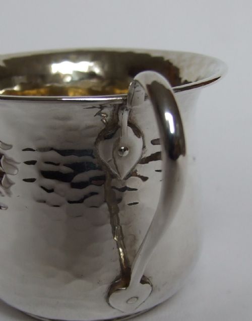 fig 1. A wonderful hammered silver Arts & Crafts mug.