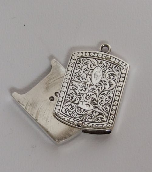 An Extremely Rare Victorian Silver Sliding Stamp Case.