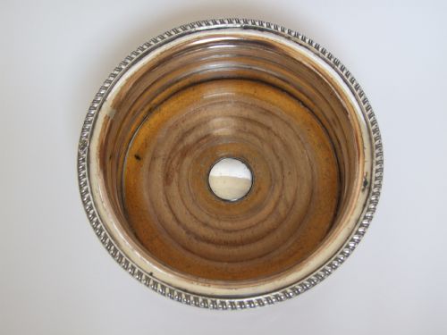 fig 1. An attractive Regency period silver plated bottle/decanter coaster.