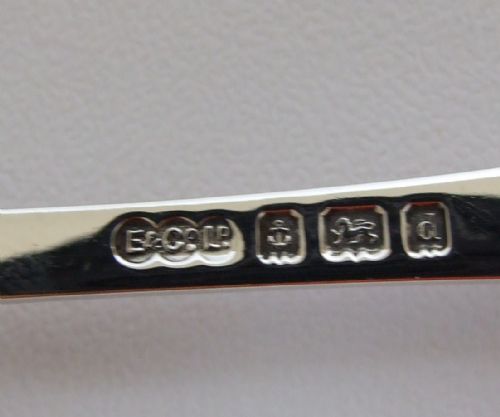 fig 1. A handsome pair of Edwardian silver gilt dessert/fruit serving spoons.